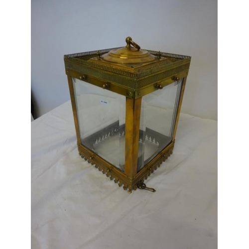 50 - Old brass framed and bevelled glass hall lantern. 1 glass panel has a crack. H. 30cm, W. 20cm