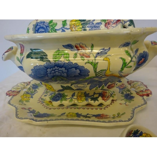 51 - A large Masons ironstone tureen complete base plate lid and cover together with an Adams China turee... 