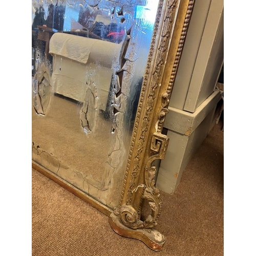 73 - Large antique gilt framed overmantle mirror, glass needs replacing and restoration required on frame... 