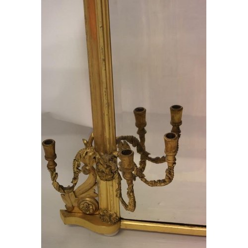 94 - Victorian giltwood overmantle mirror having bevelled glass plate and candle sconces. H. 119cm x 140c... 