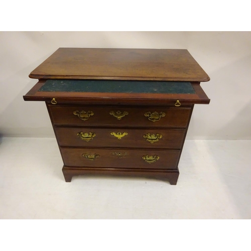 100 - An Irish Georgian mahogany chest of 2 short & 3 long drawers with pull out slide & raised on bracket... 