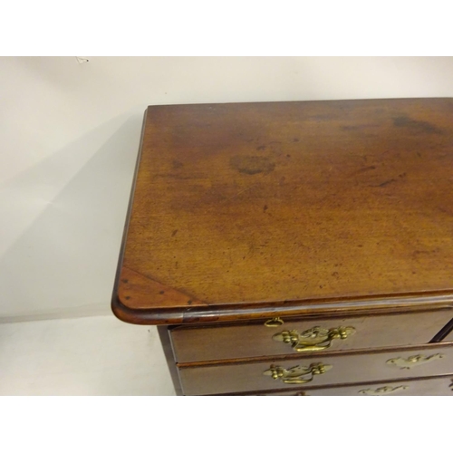 100 - An Irish Georgian mahogany chest of 2 short & 3 long drawers with pull out slide & raised on bracket... 