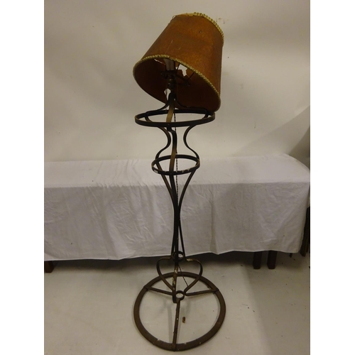 11 - Unusual iron standard floor lamp.