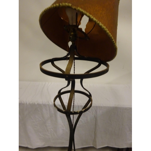 11 - Unusual iron standard floor lamp.