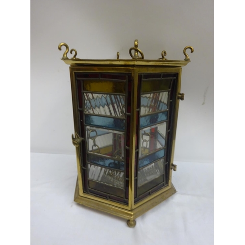 111 - Good antique brass framed and coloured glass hall lantern.