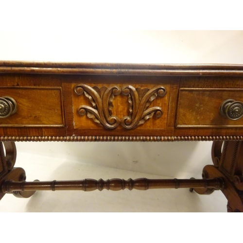 112 - A Cork Regency mahogany and satinwood banded sofa table fitted with real and dummy drawers and raise... 