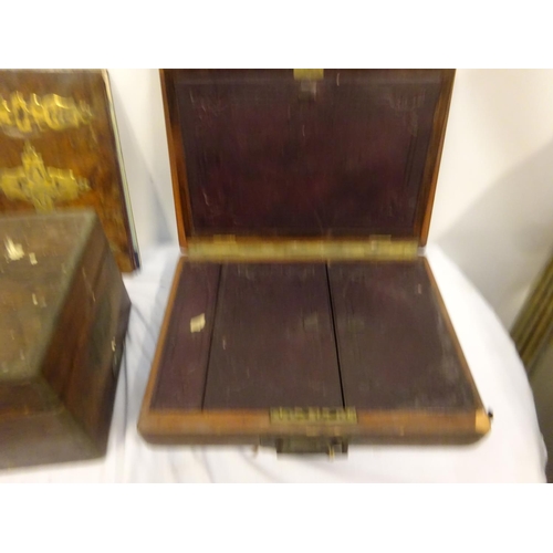 12 - Victorian walnut and brass bound blotter and two travelling boxes.