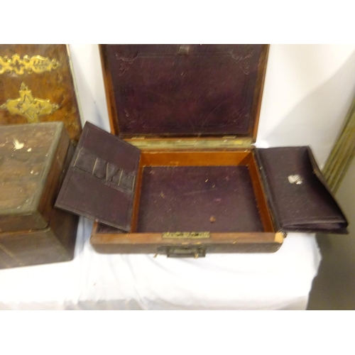 12 - Victorian walnut and brass bound blotter and two travelling boxes.