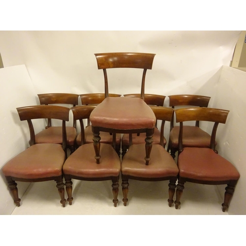 121 - A set of nine William IV mahogany dining chairs having curved bar back. (Some scroll timber pieces m... 