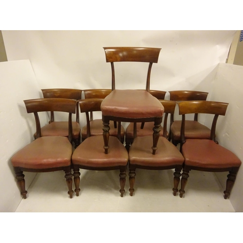 121 - A set of nine William IV mahogany dining chairs having curved bar back. (Some scroll timber pieces m... 