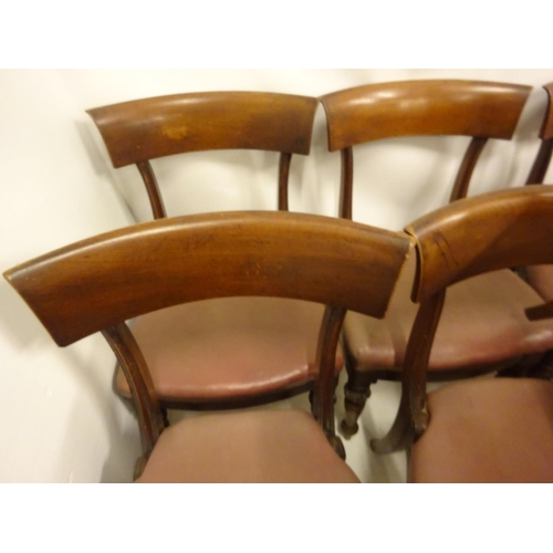 121 - A set of nine William IV mahogany dining chairs having curved bar back. (Some scroll timber pieces m... 