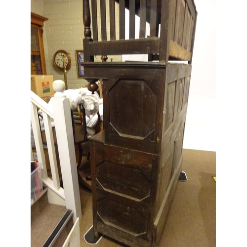 123 - A good 18th century oak court cupboard in three sections, the top section having plate rack with lat... 