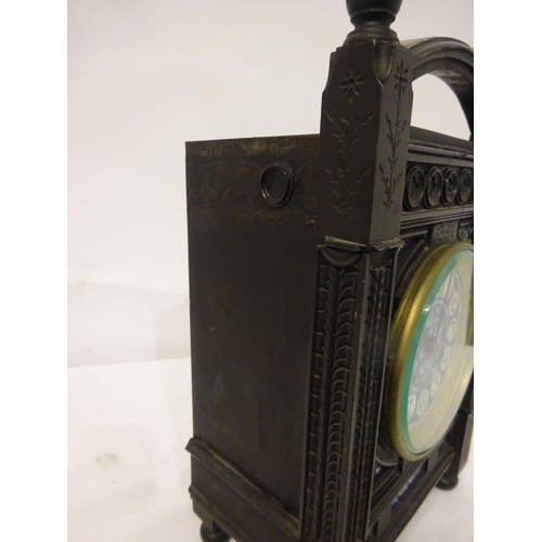 124 - Victorian ebonized cased mantle clock with blue porcelain dials and panels. Movement stamped.