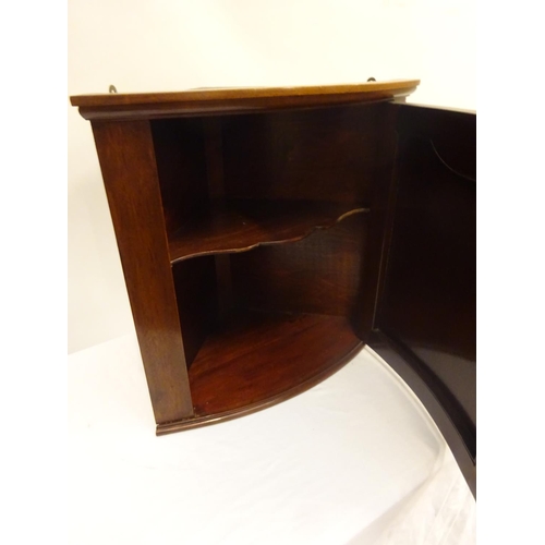 126 - Small neat sized hanging corner cabinet.