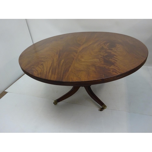 127 - A good Irish Georgian mahogany circular dining table having reeded edge, nicely turned centre column... 