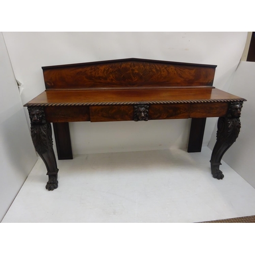 132 - A good Irish early 19th century mahogany server/side table, the top with shaped gallery and plate ra... 