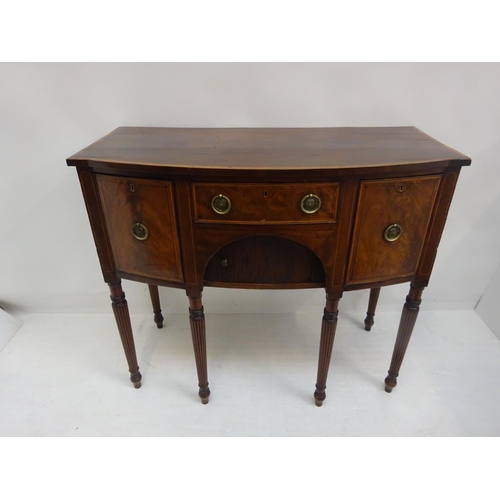 134 - A good Georgian mahogany and satinwood banded bow shaped sideboard fitted with drawers and tambour s... 