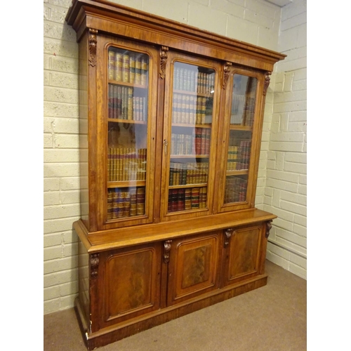 136 - A good quality 19th century mahogany three door bookcase, the upper section having three glass panel... 