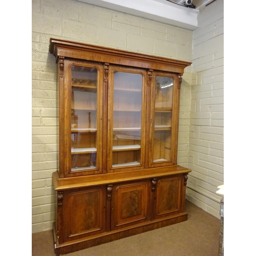 136 - A good quality 19th century mahogany three door bookcase, the upper section having three glass panel... 