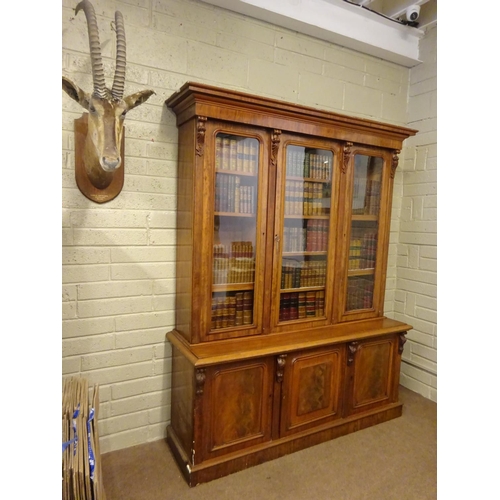 136 - A good quality 19th century mahogany three door bookcase, the upper section having three glass panel... 