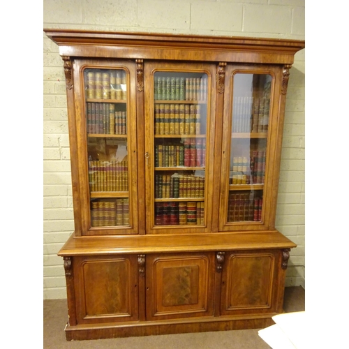 136 - A good quality 19th century mahogany three door bookcase, the upper section having three glass panel... 