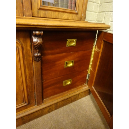 136 - A good quality 19th century mahogany three door bookcase, the upper section having three glass panel... 