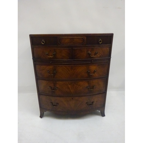 139 - A fine antique mahogany bow shaped chest, fitted with one long tambour front drawer over two short d... 