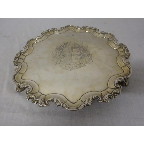 143 - A fine Irish silver salver having pie crust border and raised on three elegant feet with later inscr... 