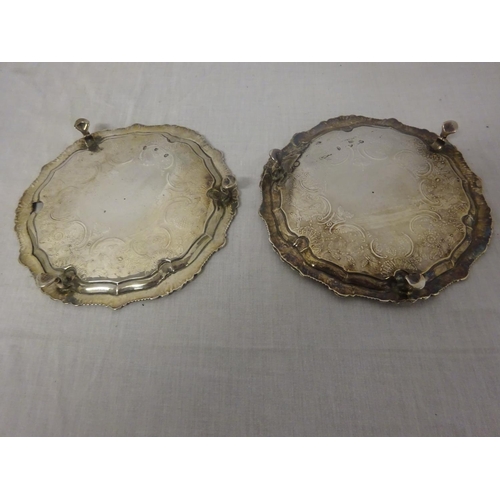 144 - A pair of Irish silver salvers possibly by Wm Homer, Dublin 1764, 24 troy ozs. (damage to both)