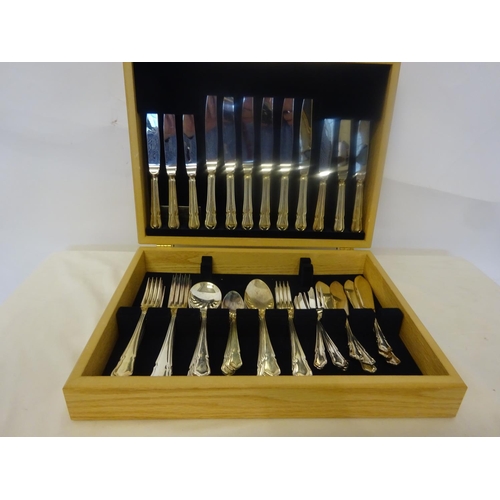 156 - Timber case canteen of Newbridge plated cutlery.