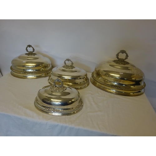 158 - A good set of 4 Sheffield plated graduated meat dish covers.