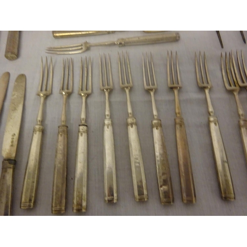 159 - A collection of English silver fruit knives and forks, a lot of the knives with loose handles (18 fo... 