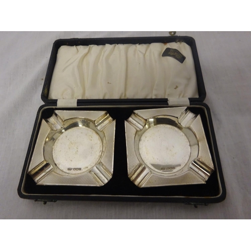 162 - A pair of English silver cased ashtrays, Sheffield 1950 retailed by William Egan, Cork.