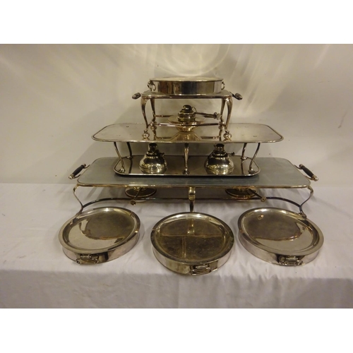 182 - A good collection of 3 plated warming stands complete with burners and 4 circular dishes.