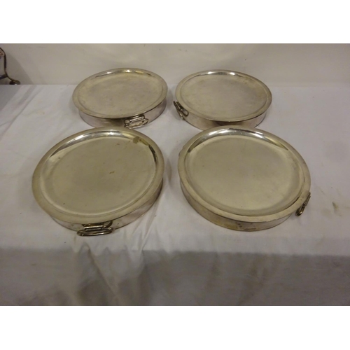 182 - A good collection of 3 plated warming stands complete with burners and 4 circular dishes.