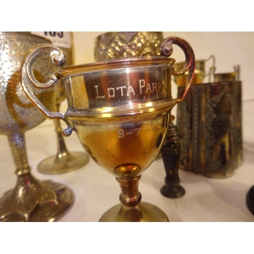 185 - A collection of one silver and several plated cups and a plated tankard and seal. The silver cup dat... 