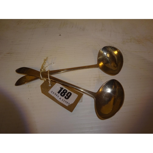 189 - A pair of Cork silver ladles by John Nicholson, circa 1790. Length 20cm approx.