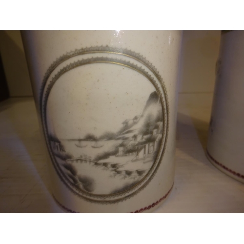 196 - A pair of antique Chinese porcelain mugs with intertwined handles. (Crack in one)