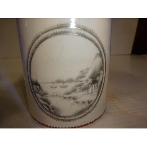 196 - A pair of antique Chinese porcelain mugs with intertwined handles. (Crack in one)