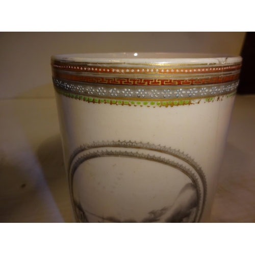 196 - A pair of antique Chinese porcelain mugs with intertwined handles. (Crack in one)