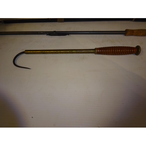 201 - A good old timber handled and brass fishing gaff together with a shouting stick, club and two snares... 