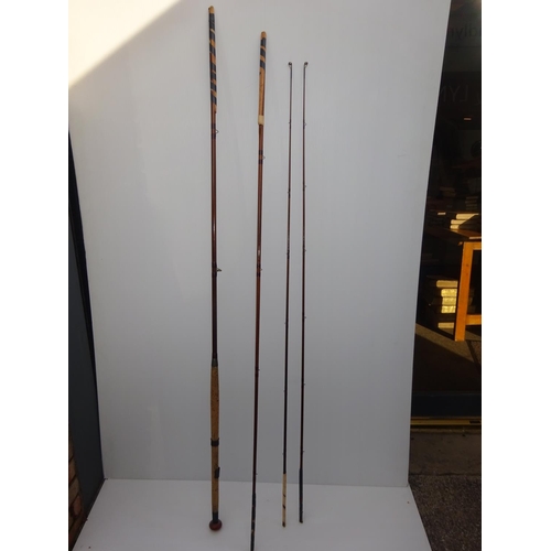 204 - Quantity of old cane fishing rods.