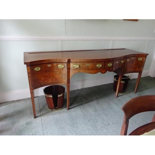 209 - A fine Georgian mahogany and satinwood inlaid sideboard, the serpentine shaped top over two centre d... 