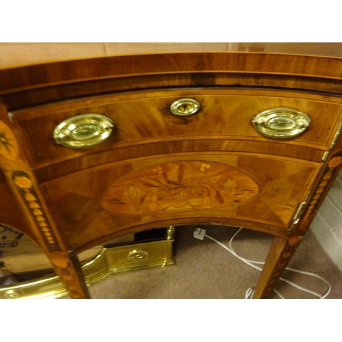 209 - A fine Georgian mahogany and satinwood inlaid sideboard, the serpentine shaped top over two centre d... 