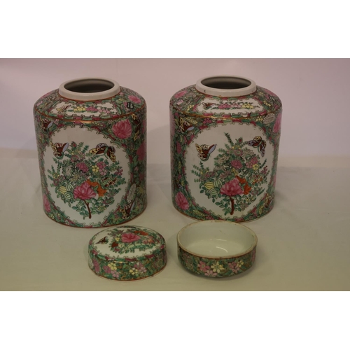 216 - A pair of Cantonese jars and lids.