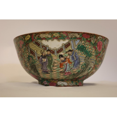 217 - A pair of Cantonese china bowls decorated throughout with figures and flowers. Diameter 30cm. Excell... 