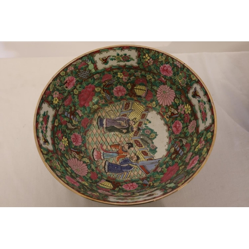 217 - A pair of Cantonese china bowls decorated throughout with figures and flowers. Diameter 30cm. Excell... 