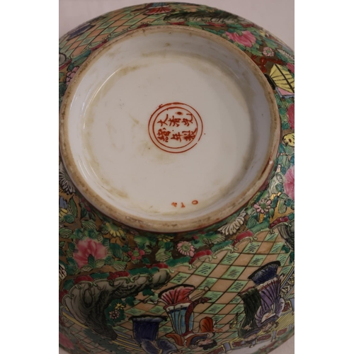 217 - A pair of Cantonese china bowls decorated throughout with figures and flowers. Diameter 30cm. Excell... 