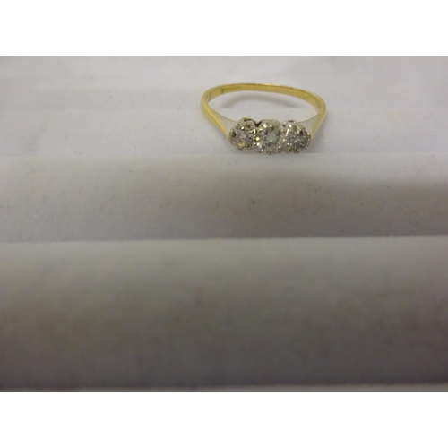 232 - 18ct gold and platinum 3 stone diamond ring. Size O.