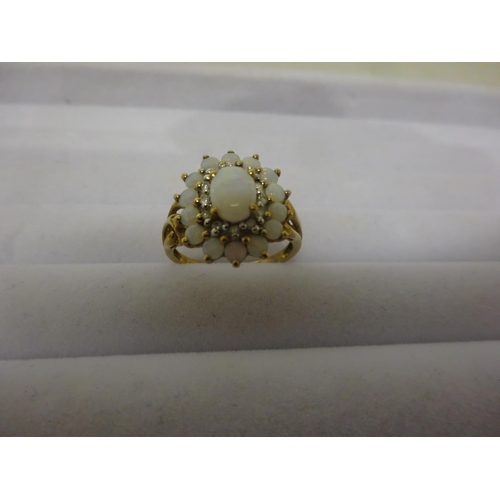 236 - Ladies 9ct gold opal and diamond ring. Size N/O.